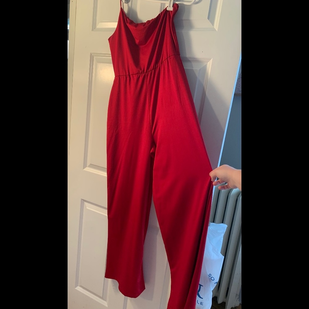 Red one shoulder jumpsuit